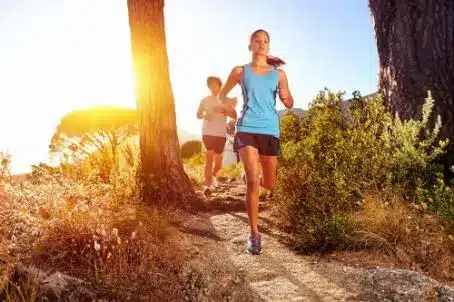 man and woman running